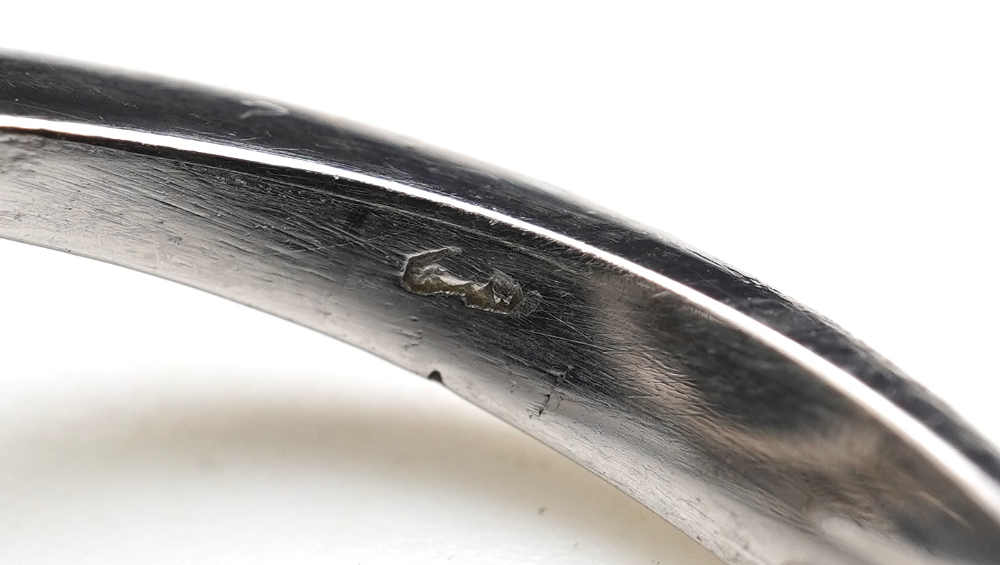 An opal triplet and diamond ring